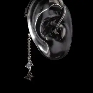 Deafmetal Butterflies hearing aid and cochclear implant retention jewlery to be used with Deafetal holster